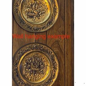 set of vintage 3 embossed brass wall-hanging plates.